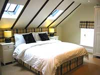 Double bedroom at Weavers Hall self-catering cottage, Newburgh, Fife, Scotland, UK